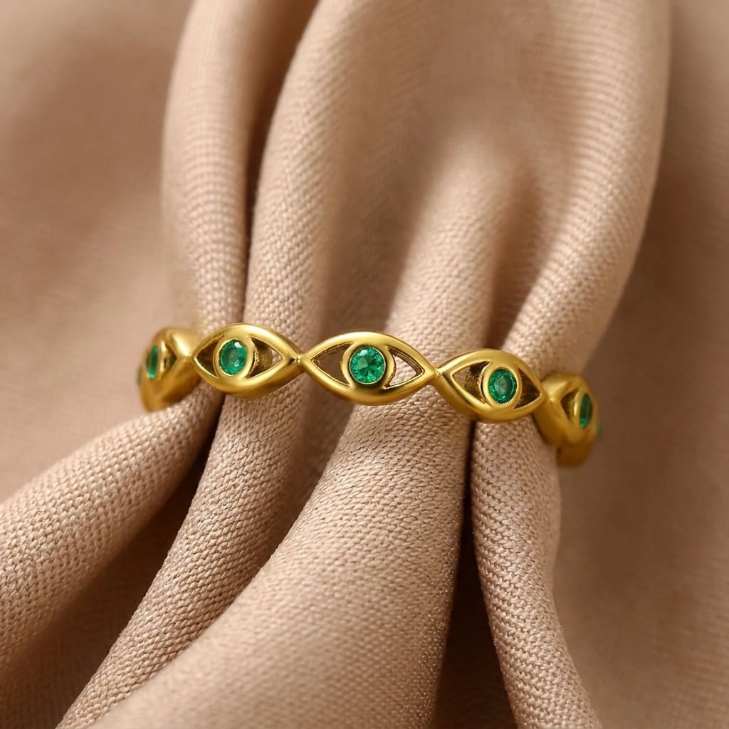 Evil-Eye Ring mit grünen Zirkonia-Steinen